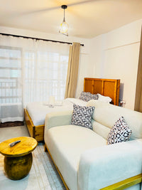 Ngara Studio airbnb with a balcony