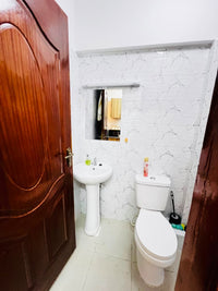 Ngara Studio airbnb with a balcony