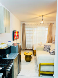 Ngara Studio airbnb with a balcony